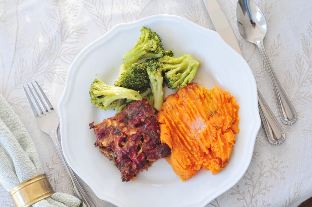 plate of meatloaf and potatoes and broccoli