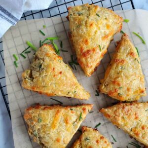 cheddar chive sourdough scones on a cooling rack