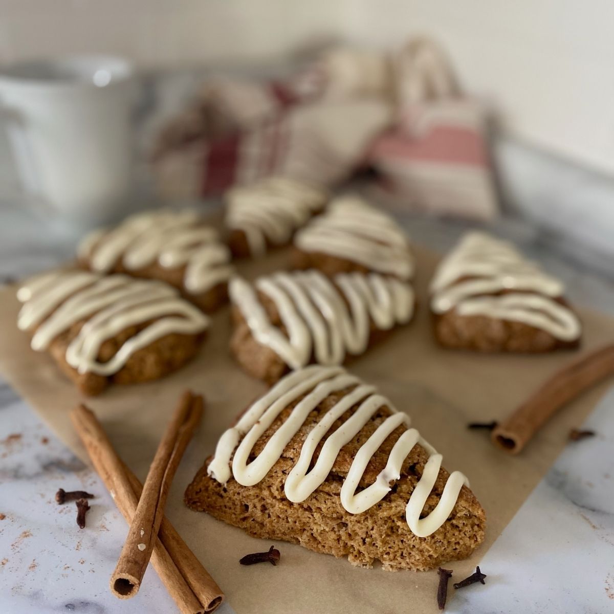 gingerbread sourdough scones on parchment paper