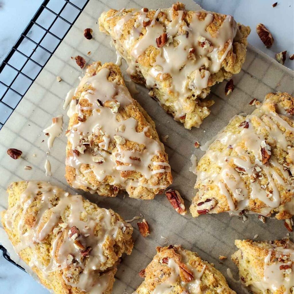 maple pecan sourdough scones on a cooling rack