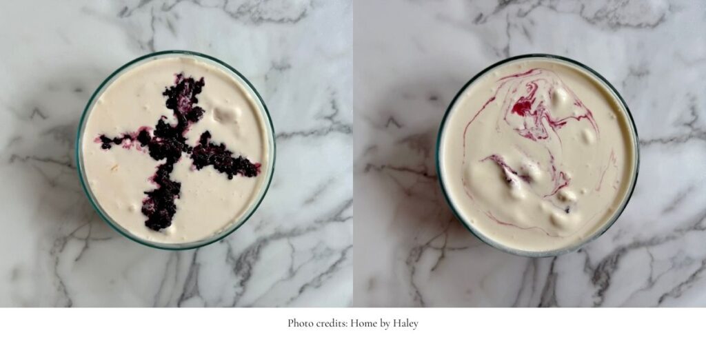 blackberry cheesecake ice cream in a glass container