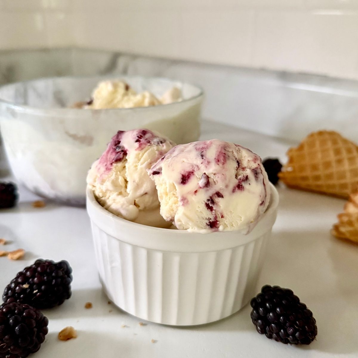 blackberry cheesecake ice cream in a ramekin
