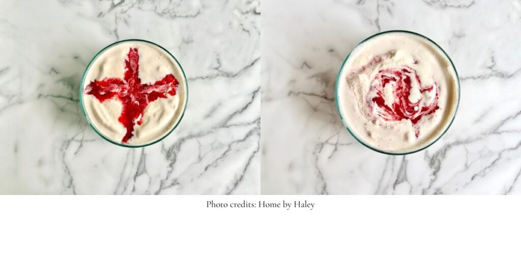 strawberry cheesecake raw milk ice cream in a glass bowl
