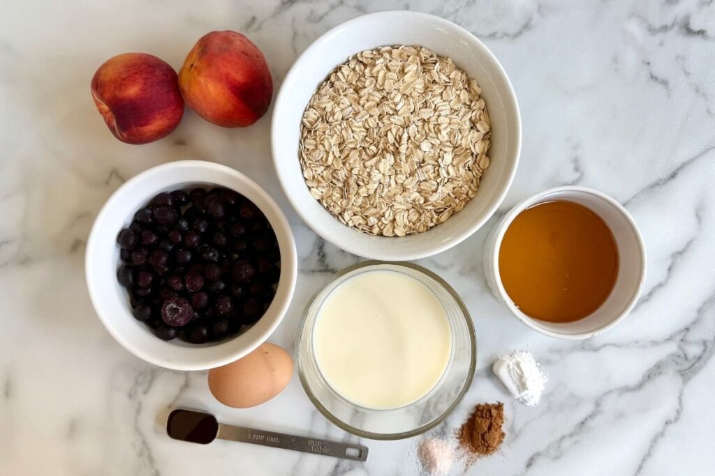 ingredients in bowls for brown butter peach blueberry baked oatmeal