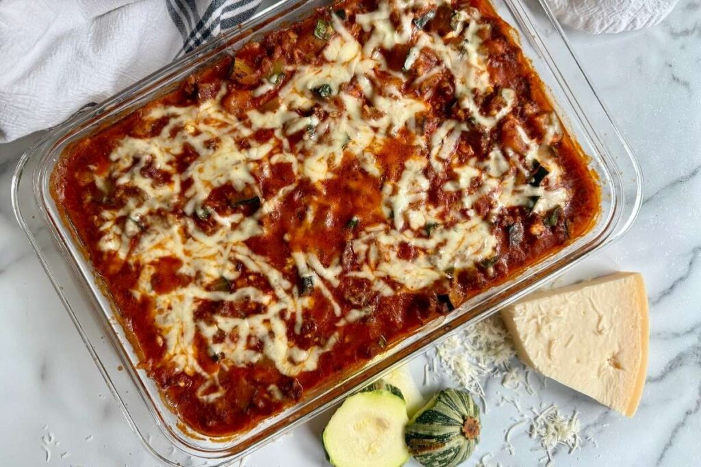 deconstructed zucchini lasagna in a baking dish on a counter