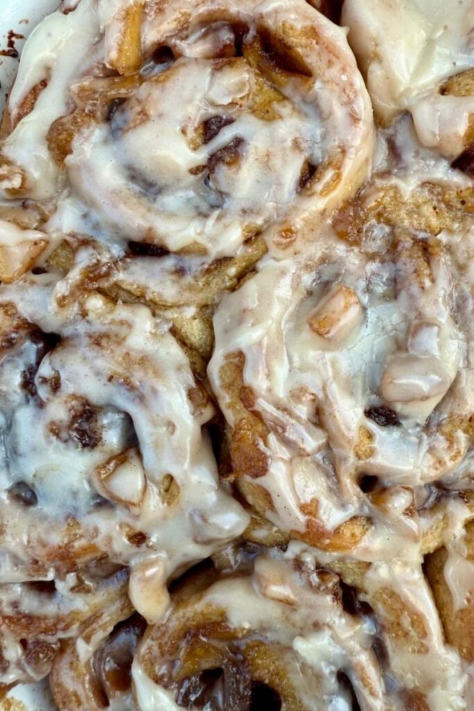 apple pie sourdough cinnamon rolls with fresh milled flour and vanilla icing