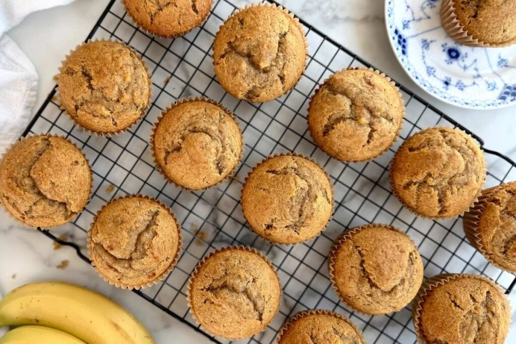 fresh milled einkorn banana muffins on a baking rack