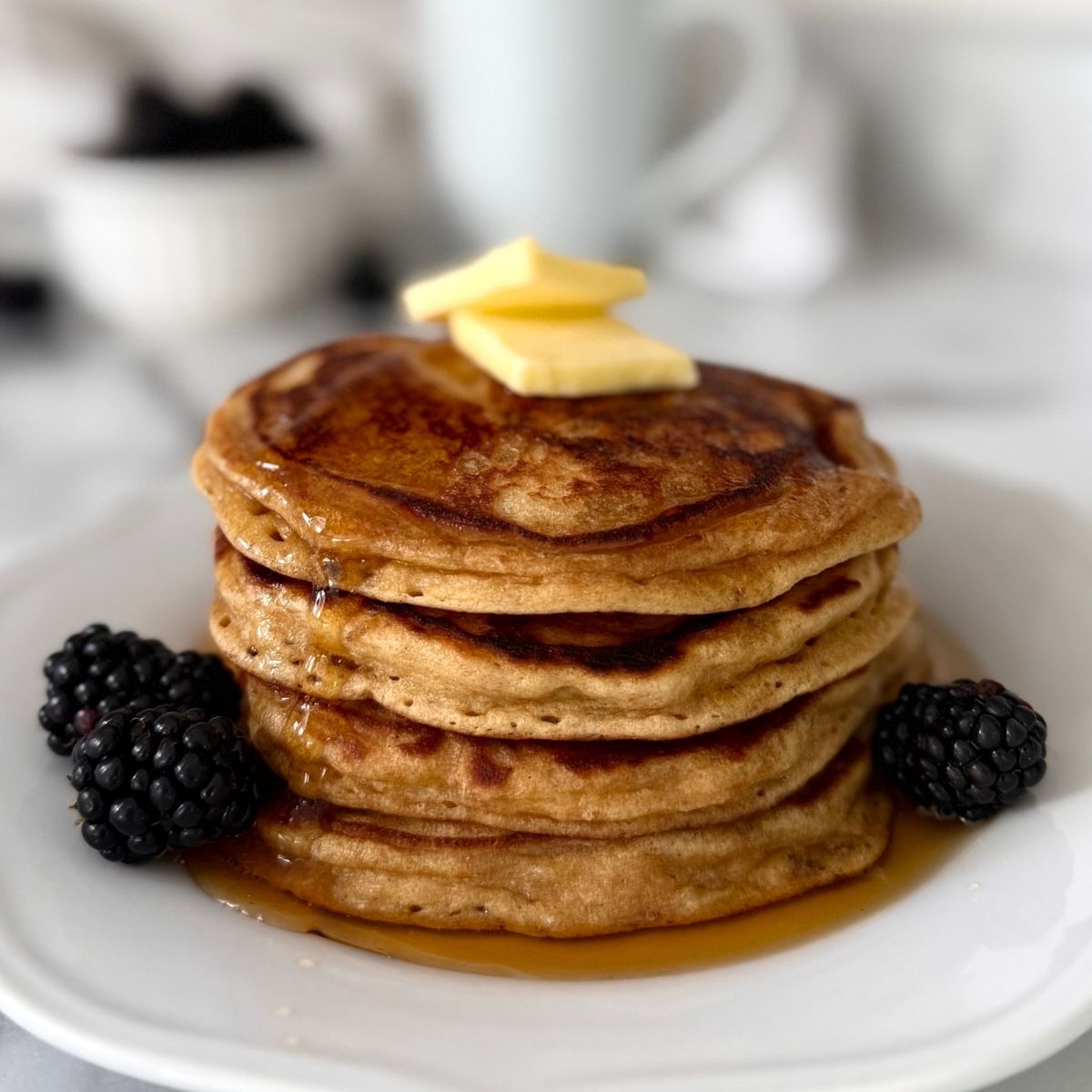 fresh milled einkorn buttermilk pancakes on a plate