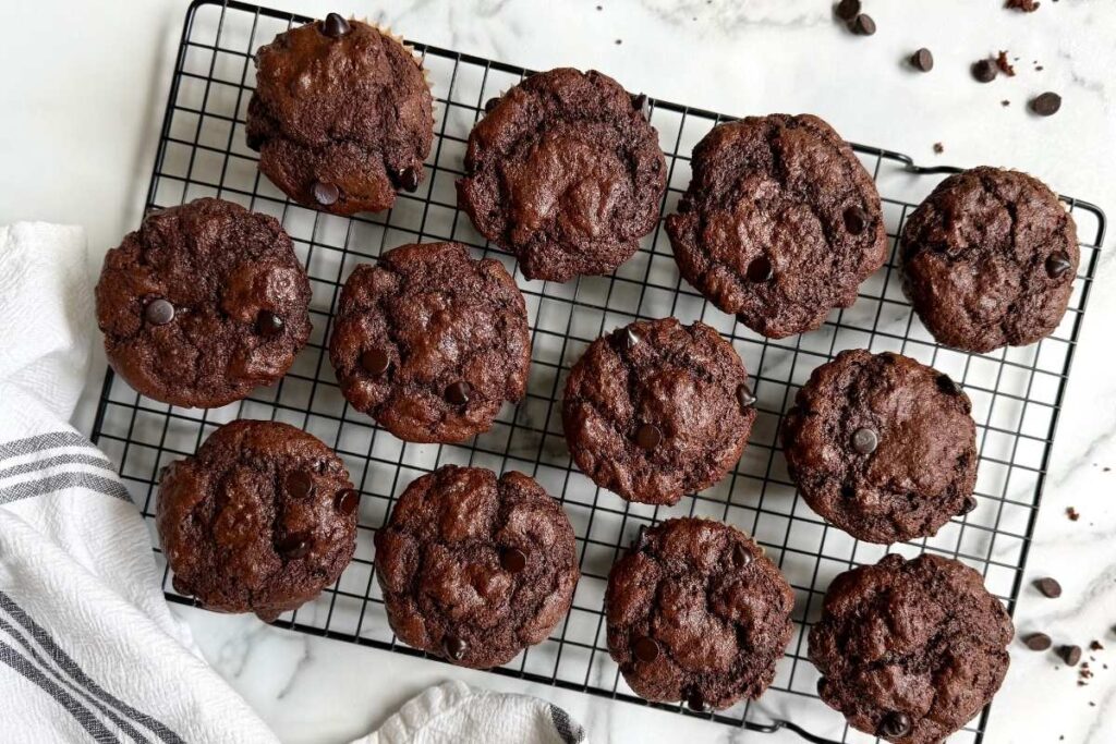fresh milled flour double chocolate muffins on a cooling rack